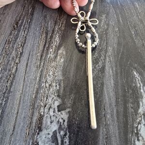 Silver and Hair Clip Brand L Rose Biz